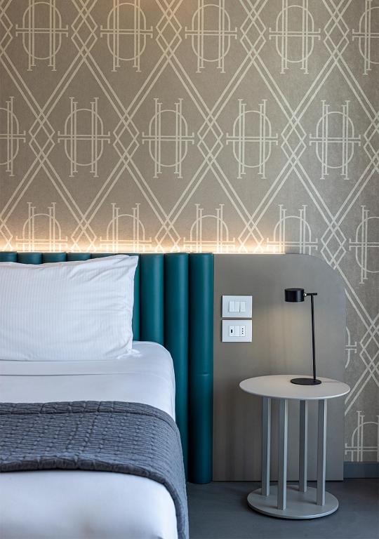 Postel nebo postele na pokoji v ubytování DIVA HOTEL LIGNANO - Adults Only