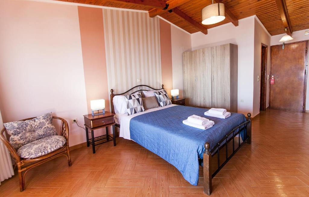 Postel nebo postele na pokoji v ubytování Hotel Thetis