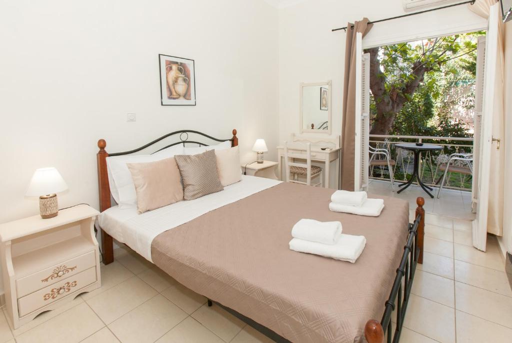 Postel nebo postele na pokoji v ubytování Hotel Thetis