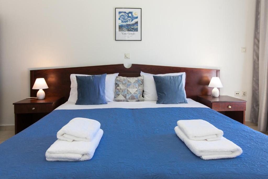 Postel nebo postele na pokoji v ubytování Hotel Thetis