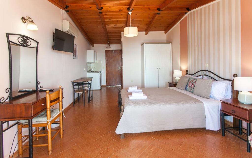 Postel nebo postele na pokoji v ubytování Hotel Thetis