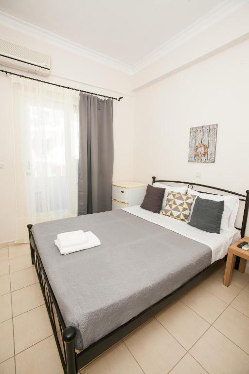 Postel nebo postele na pokoji v ubytování Hotel Thetis