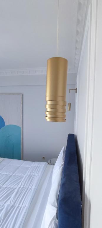 Postel nebo postele na pokoji v ubytování l' atoll d' Helene