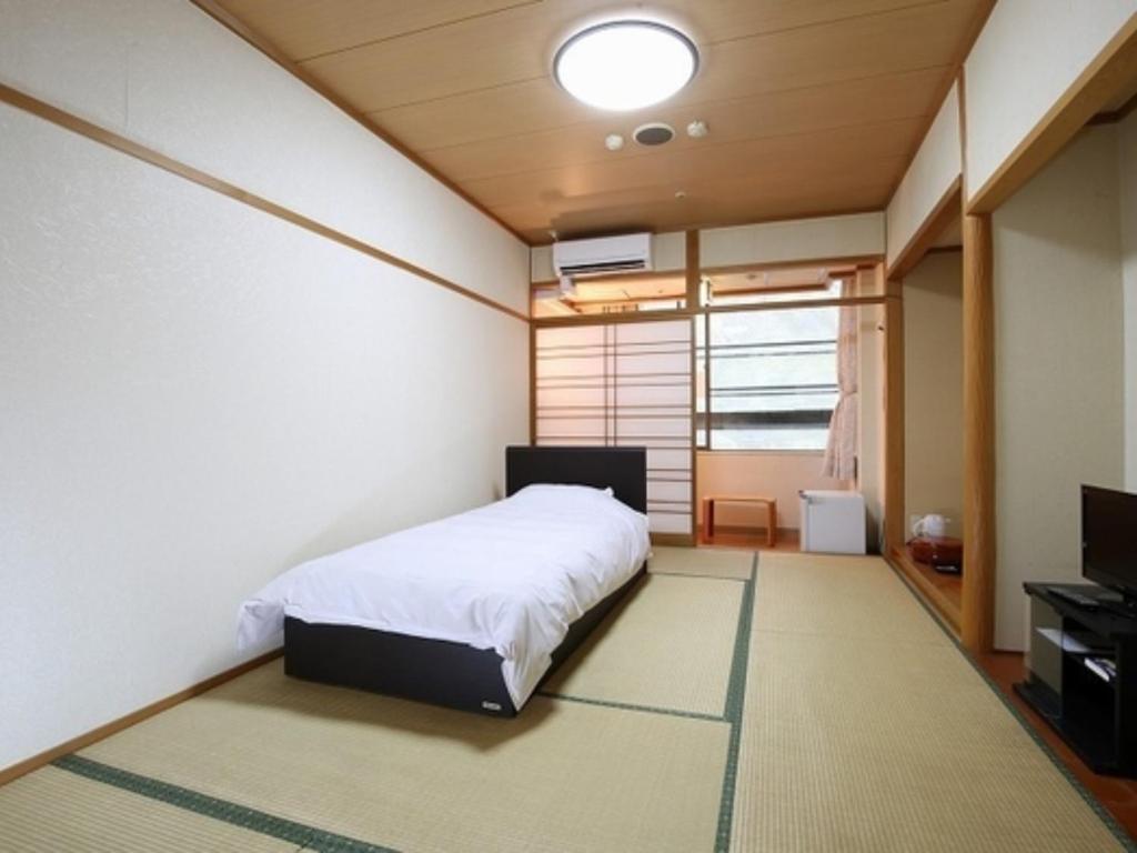 Säng eller sängar i ett rum på Blancart Misasa - Vacation STAY 14624v