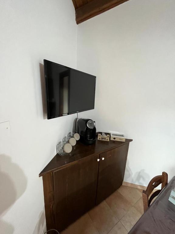 TV a/nebo společenská místnost v ubytování B&B La cas' d'Alfonz'