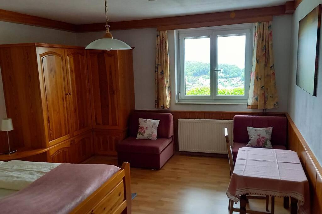 Postel nebo postele na pokoji v ubytování Haus Sonnenhang +Seeblick+Pool