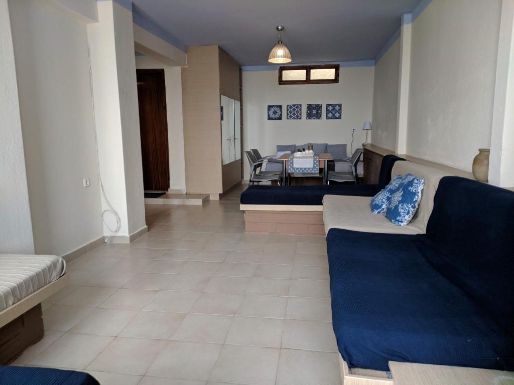 A seating area at Zennova #3 Mount Athos & Sea View