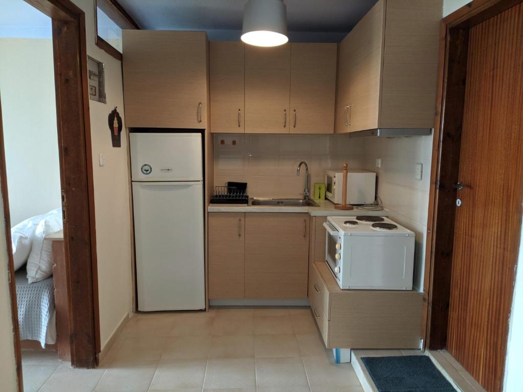 A kitchen or kitchenette at Zennova #3 Mount Athos & Sea View