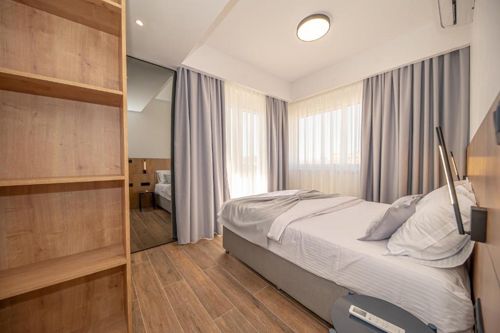 Postel nebo postele na pokoji v ubytování N&N Lux Guest house