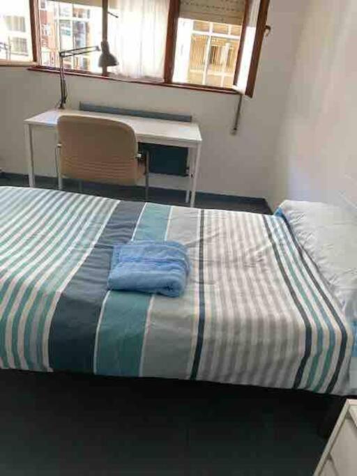 Postel nebo postele na pokoji v ubytování Cómodo apartamento en el centro de Oviedo