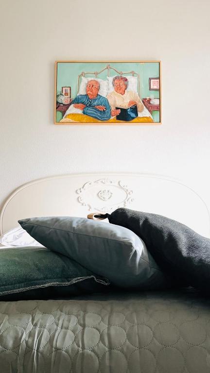 Postel nebo postele na pokoji v ubytování Hotel Greate Pier