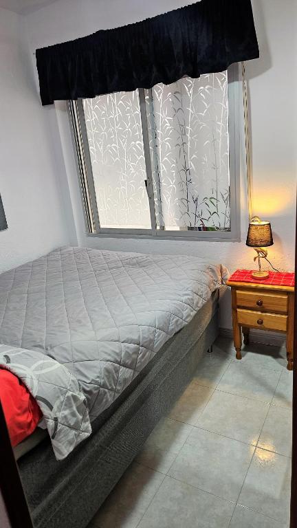 Postel nebo postele na pokoji v ubytování Sunny Stay Apartamento