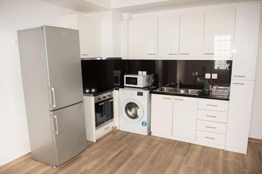 A kitchen or kitchenette at City view modern apartment (D3_FAL)