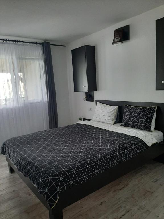 Postel nebo postele na pokoji v ubytování La Piticu