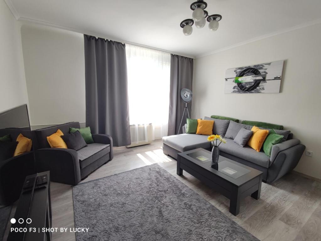 Posezení v ubytování Central Greatforest Apartman