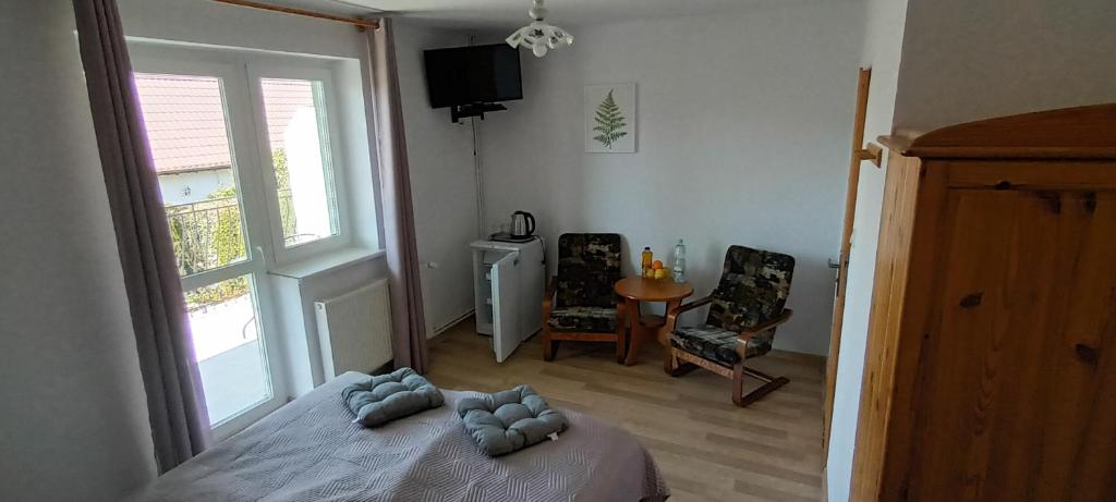 Posezení v ubytování Dom Wypoczynkowy PRZYLESIE7