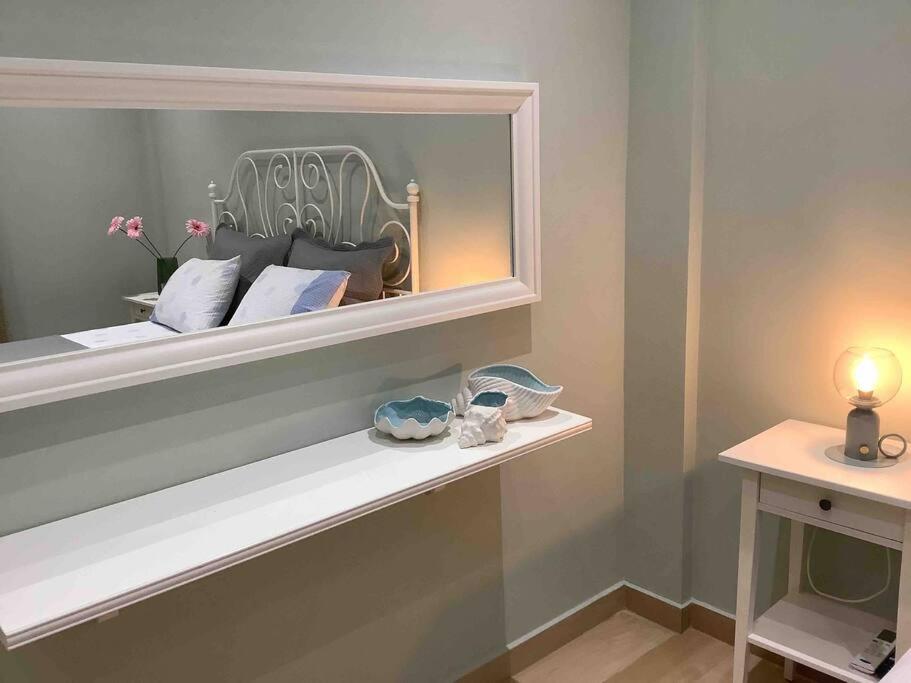 Postel nebo postele na pokoji v ubytování NG Luxury Apartments at Nea Kallikrateia No 1
