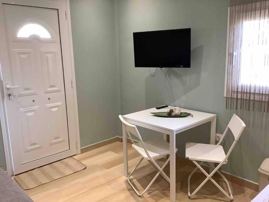 TV a/nebo společenská místnost v ubytování NG Luxury Apartments at Nea Kallikrateia No 1