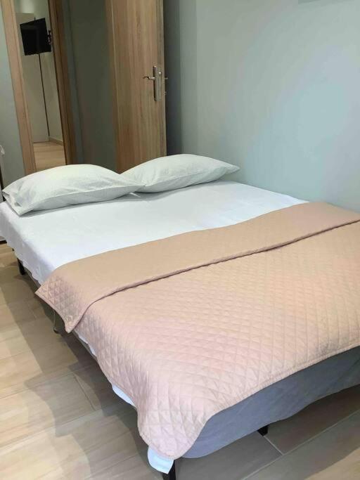 Postel nebo postele na pokoji v ubytování NG Luxury Apartments at Nea Kallikrateia No 1
