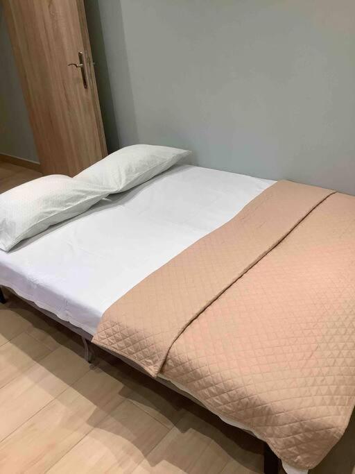 Postel nebo postele na pokoji v ubytování NG Luxury Apartments at Nea Kallikrateia No 1