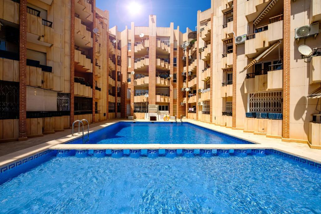 Bazén v ubytování Holiday Playa Jardin IV nebo v jeho okolí