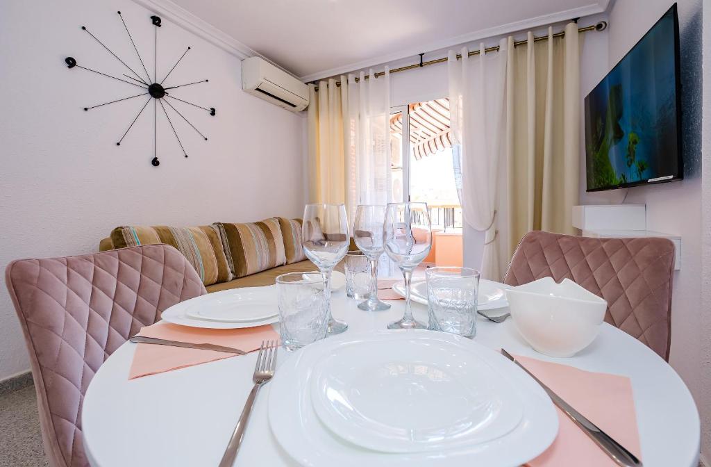 TV a/nebo společenská místnost v ubytování Holiday Playa Jardin IV
