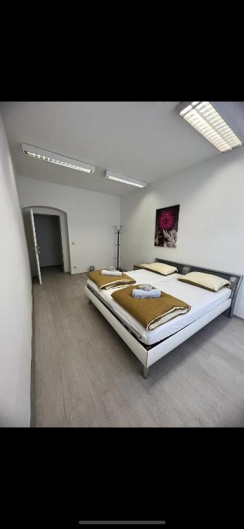 Postel nebo postele na pokoji v ubytování Rosens Wien