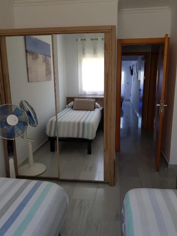 Postel nebo postele na pokoji v ubytování HR PARADISE CALA DE LA VILA JOIOSA