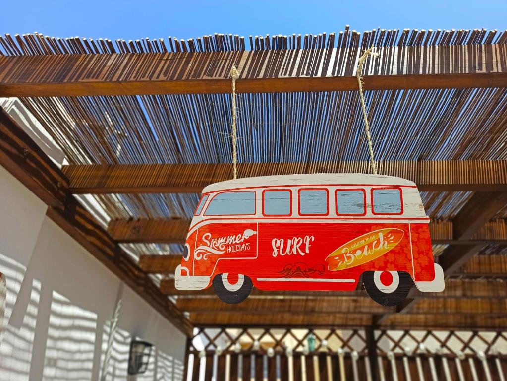 a toy van is hanging from a ceiling at Barceló 21, parking on request, Atico With terrace & Studio With Patio, Center, breakfast included, quite neighborhood, BC in Málaga