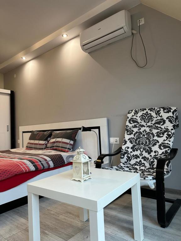 Postel nebo postele na pokoji v ubytování Victoria Hotel Rooms & Victoria Apartment Veliko Tarnovo