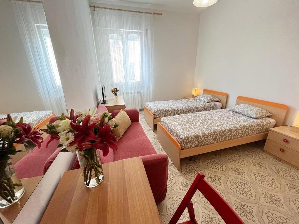 Postel nebo postele na pokoji v ubytování Casa Hana