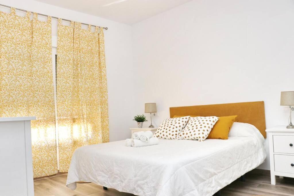 Postel nebo postele na pokoji v ubytování APARTAMENTOS RURALES (LA COBIJÁ) APART. Nº3 CONIL