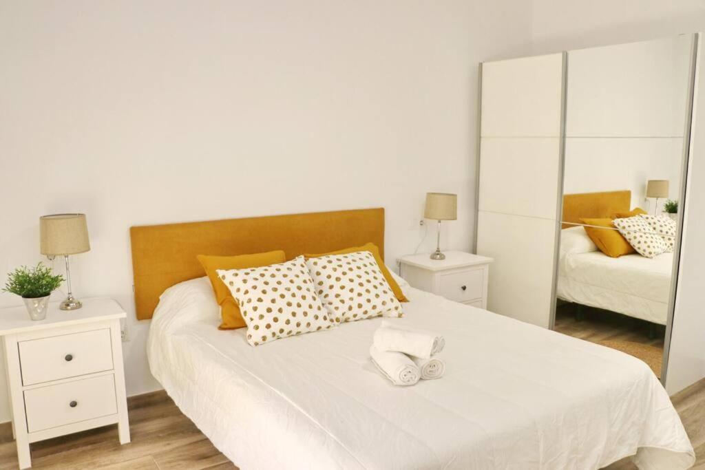 Postel nebo postele na pokoji v ubytování APARTAMENTOS RURALES (LA COBIJÁ) APART. Nº3 CONIL
