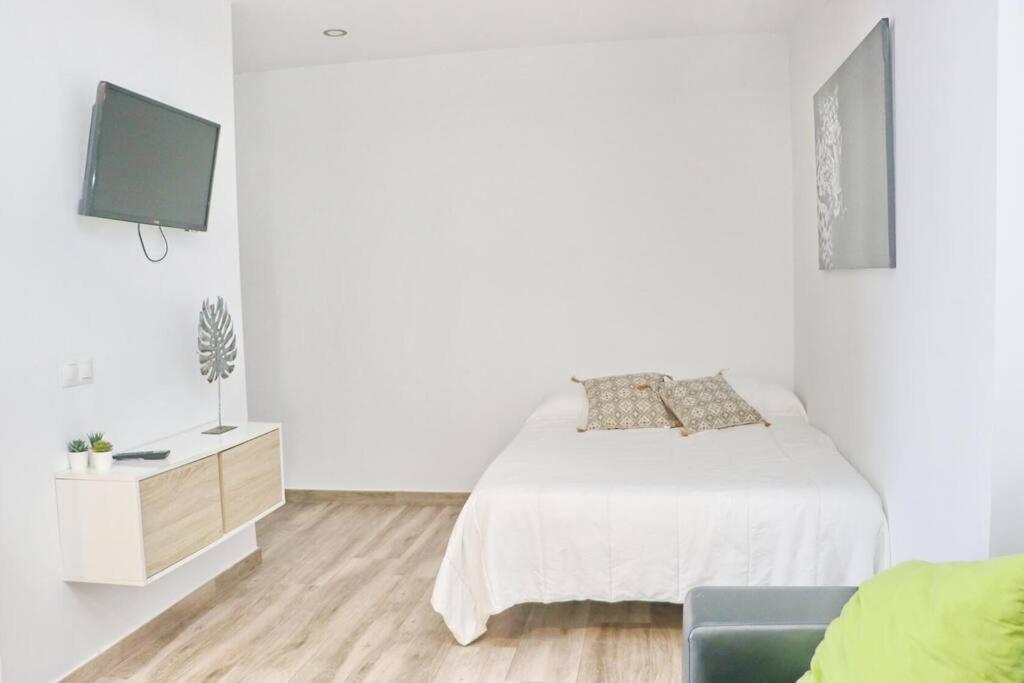 Postel nebo postele na pokoji v ubytování APARTAMENTOS RURALES (LA COBIJÁ) APART. Nº3 CONIL