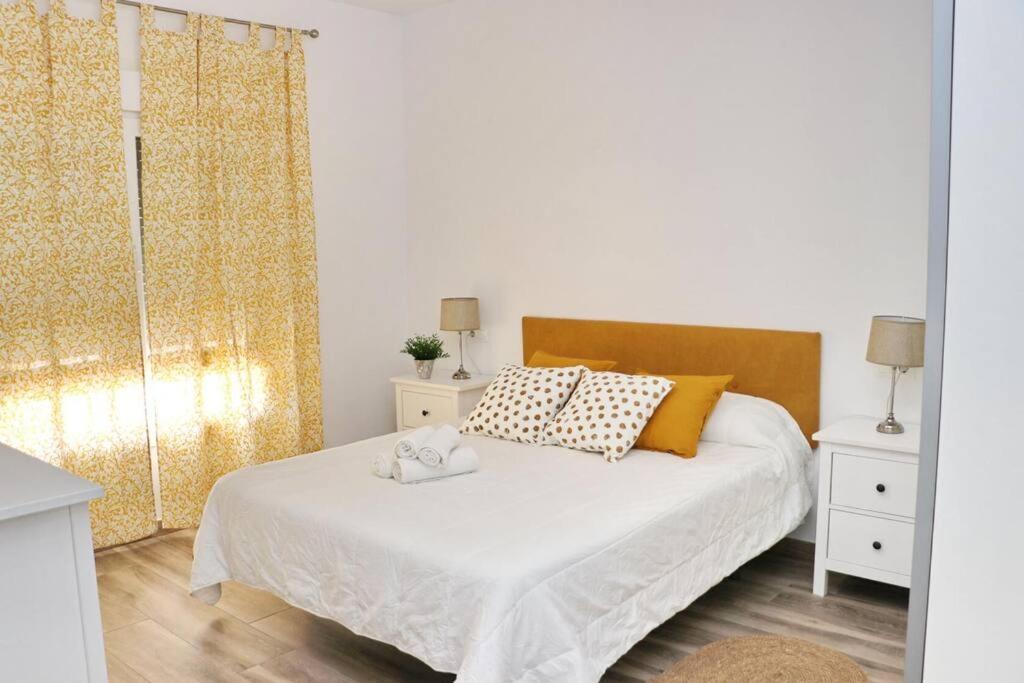 Postel nebo postele na pokoji v ubytování APARTAMENTOS RURALES (LA COBIJÁ) APART. Nº3 CONIL