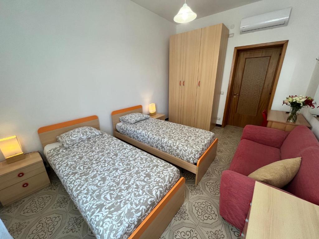 Postel nebo postele na pokoji v ubytování Casa Hana