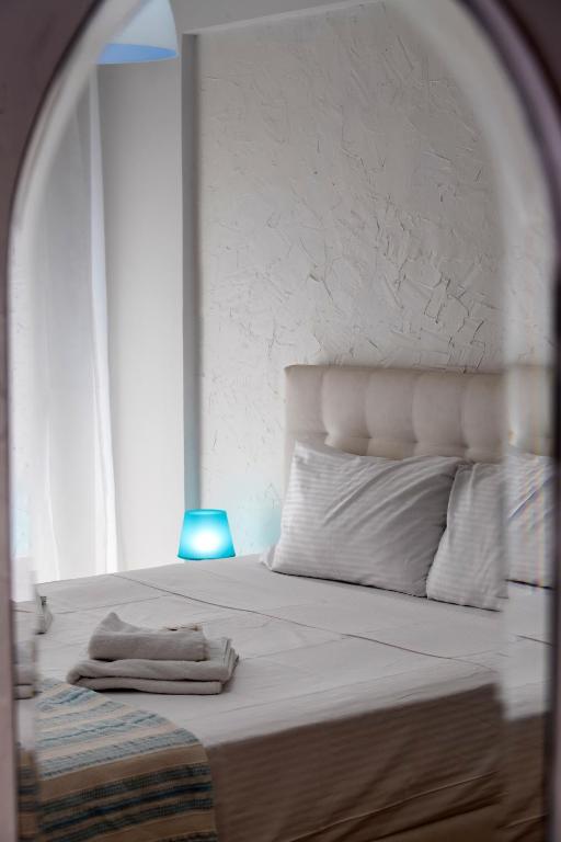 Łóżko lub łóżka w pokoju w obiekcie Seaview Rooms