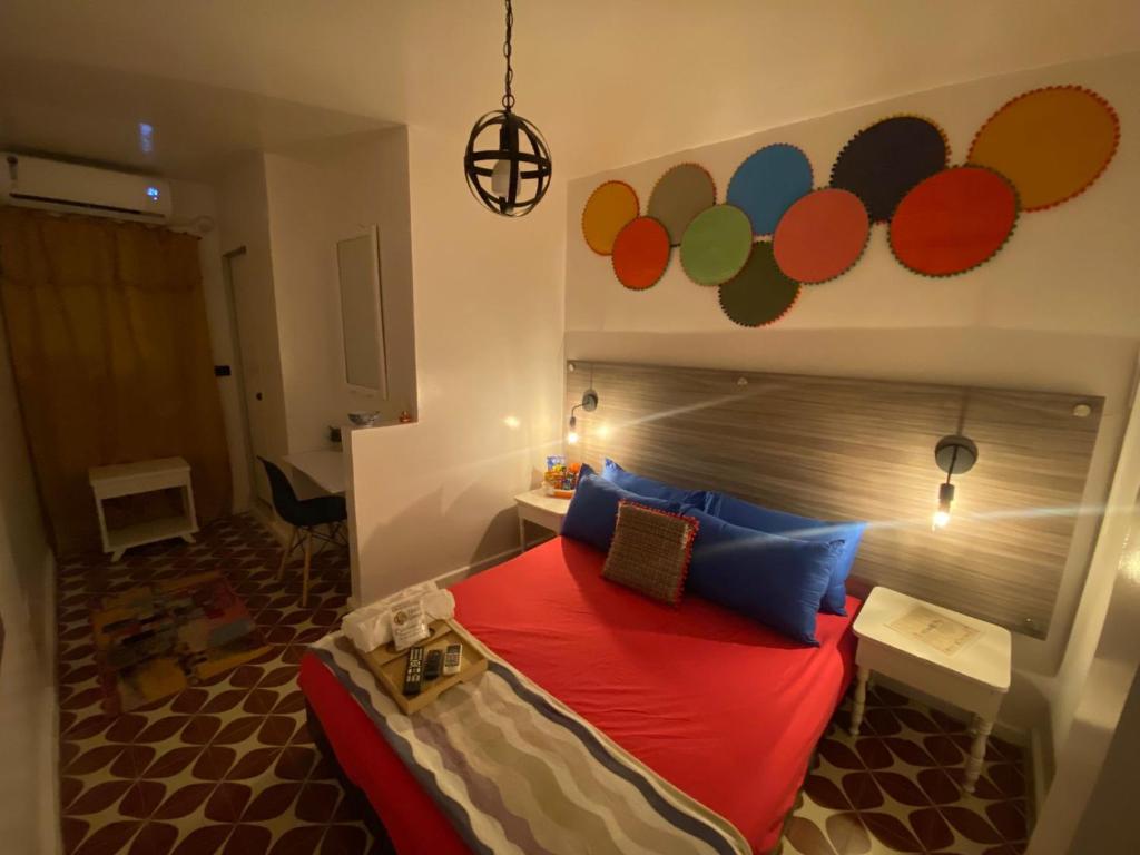 Cama o camas de una habitación en Hotel Tamaiti