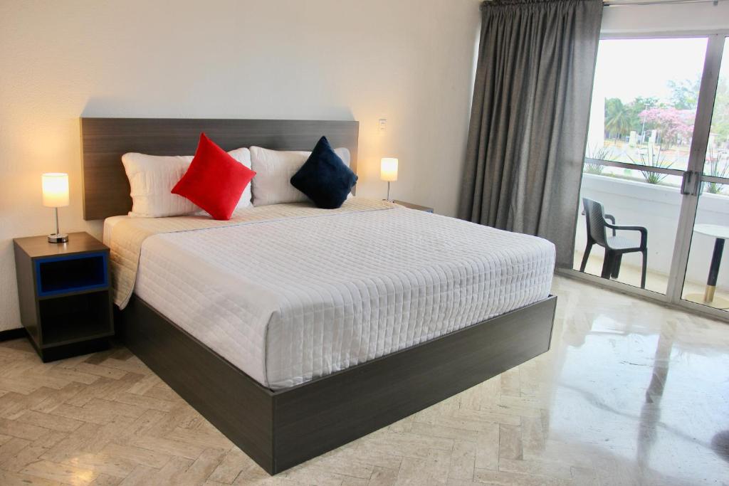Postel nebo postele na pokoji v ubytování BOK21 - Hotel en Cancun
