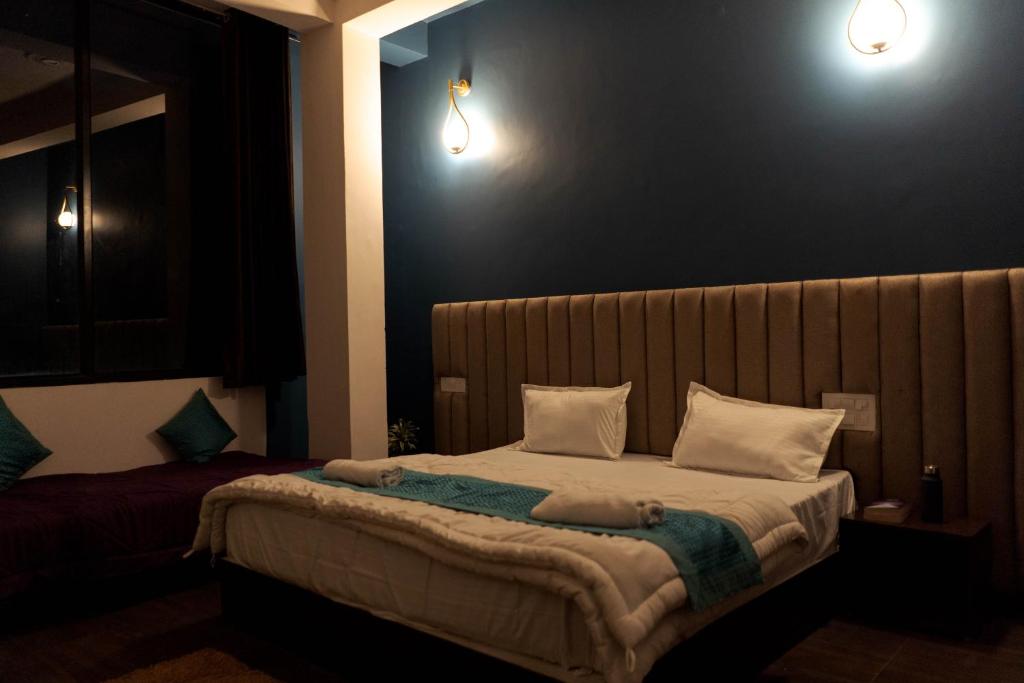 Postel nebo postele na pokoji v ubytování Spontrail Hostel
