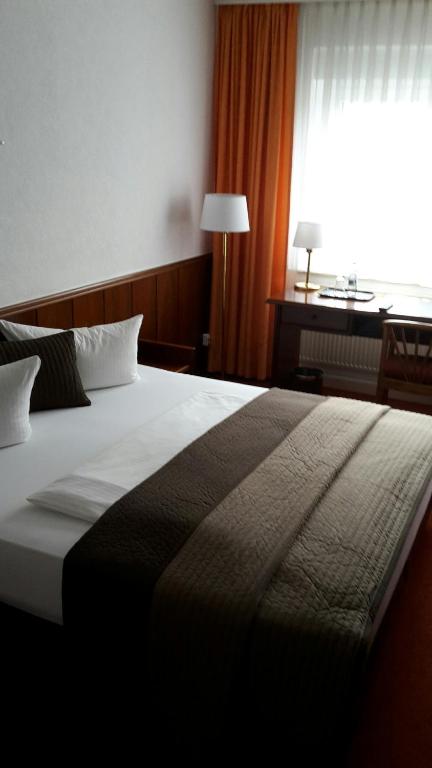Voodi või voodid majutusasutuse Hotel "Am Fischhof" toas