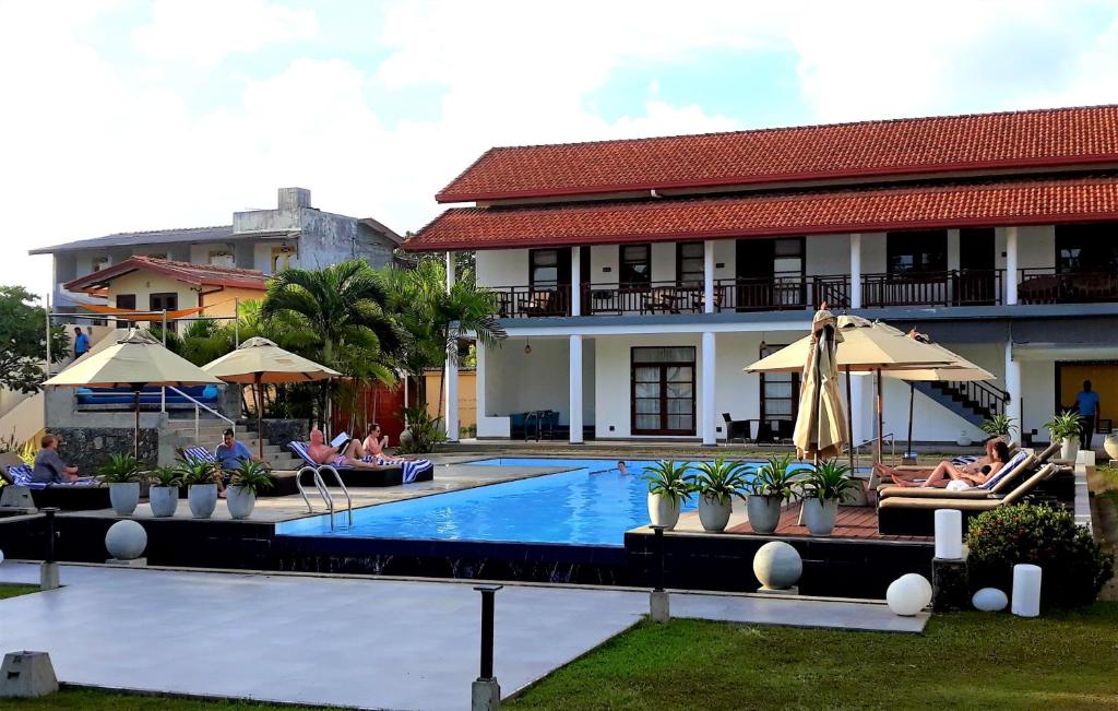 Bazén v ubytování IMAGINE Villa Hotel nebo v jeho okolí