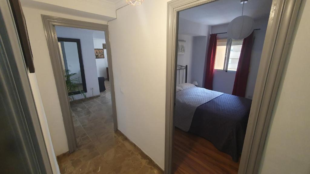 Posteľ alebo postele v izbe v ubytovaní Visit Gibraltar stay in La Linea for less!