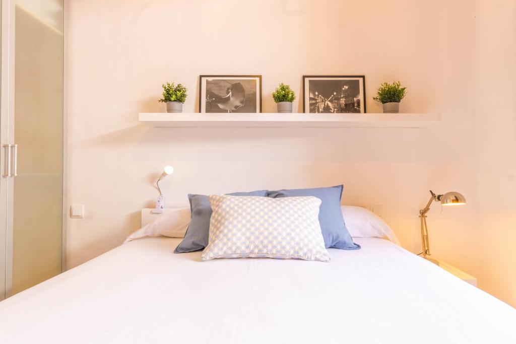 Posteľ alebo postele v izbe v ubytovaní Apartamento Anais Centro Sevilla