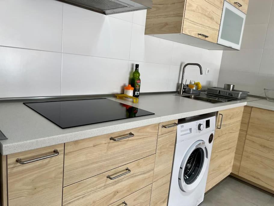 Kuchyň nebo kuchyňský kout v ubytování Apartamento Aguanaz 1
