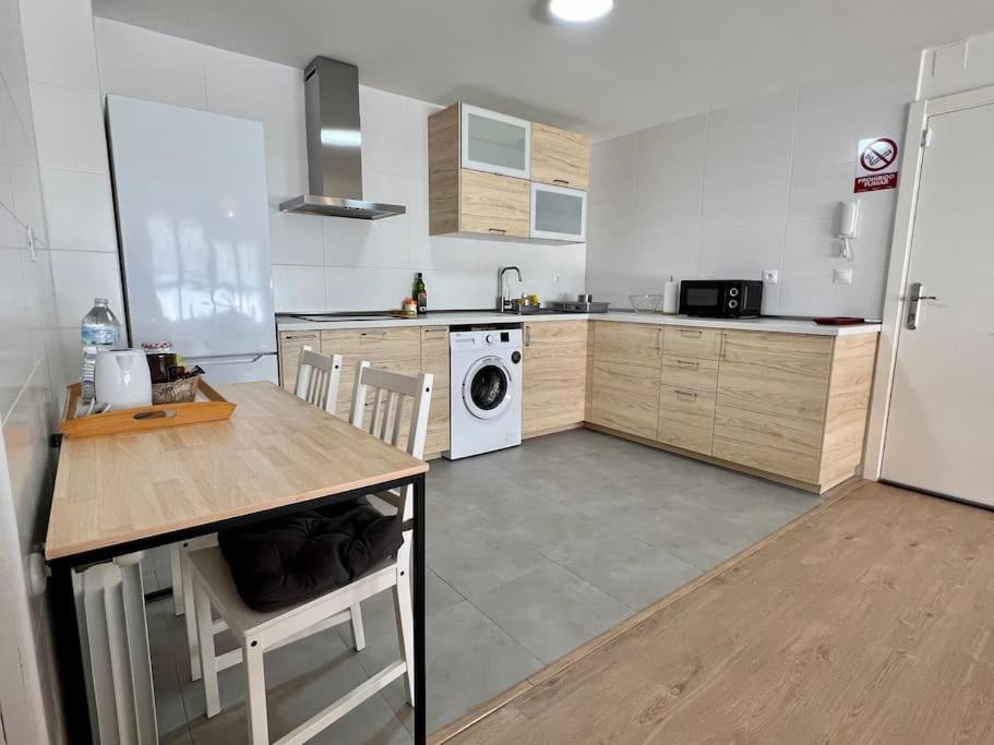 Kuchyň nebo kuchyňský kout v ubytování Apartamento Aguanaz 1