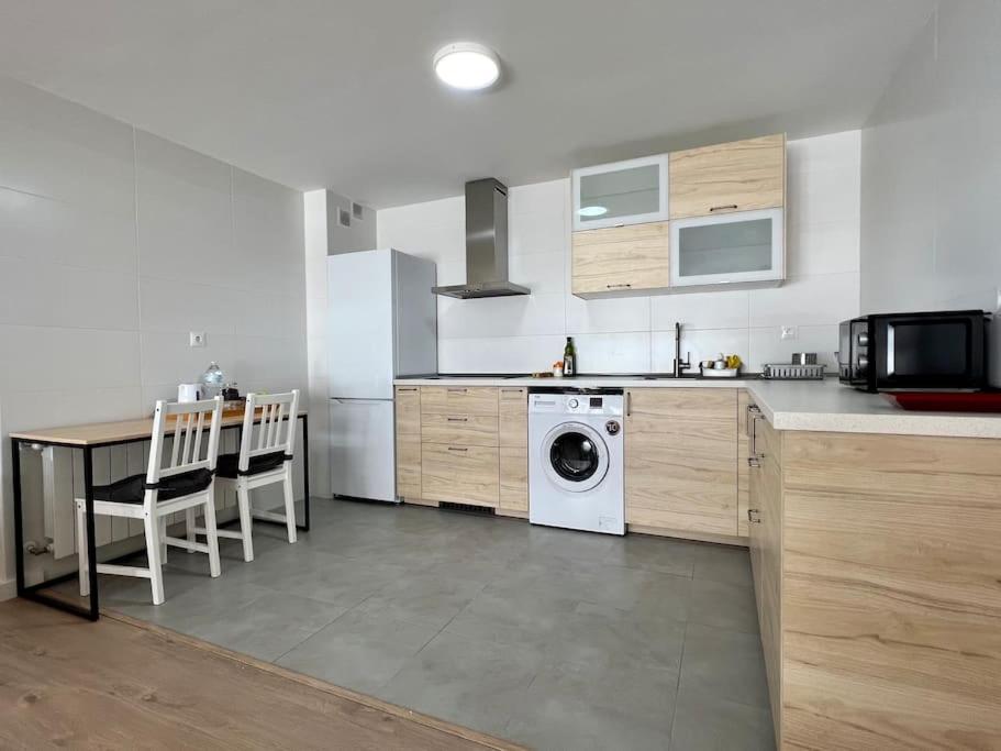 Kuchyň nebo kuchyňský kout v ubytování Apartamento Aguanaz 1