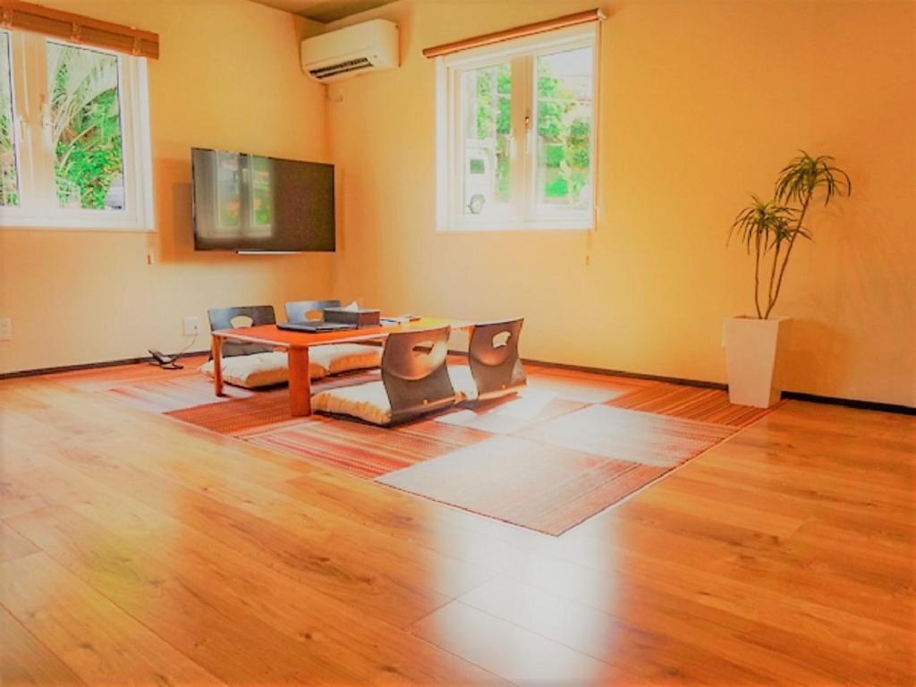 TV a/nebo společenská místnost v ubytování LiVEMAX RESORT Izu Shimoda