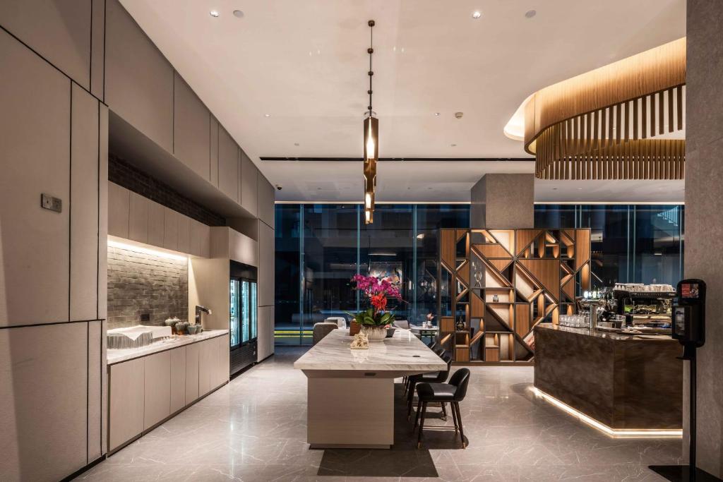 Posezení v ubytování UrCove by Hyatt Shanghai Lujiazui Expo Center