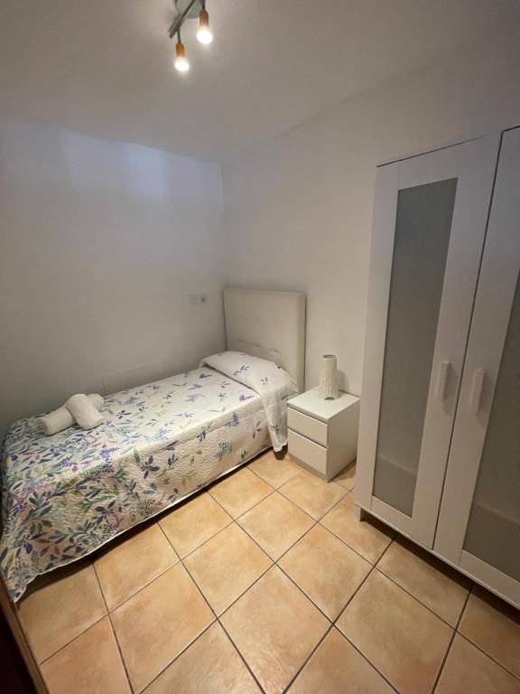 Postel nebo postele na pokoji v ubytování Apartamento Gaudia